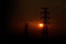 夕陽と鉄塔の写真素材