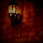 レンガの壁と照明の写真素材