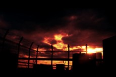 屋上と夕陽の写真素材